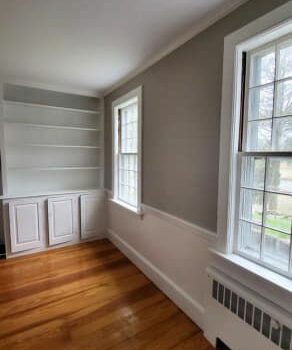 Professional Painting Company Enhances Wood-Floored Room