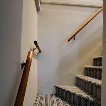 Professional Painting Company Transforms Staircase Bookcase