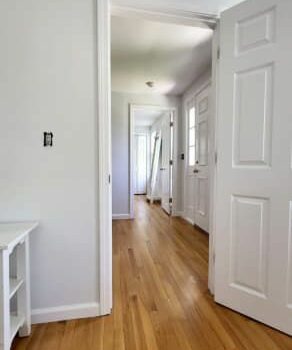 Professional Painting Company Transforms Hallway Doors